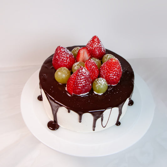 Chocolate Bliss Cake with Fresh Fruit Garnish